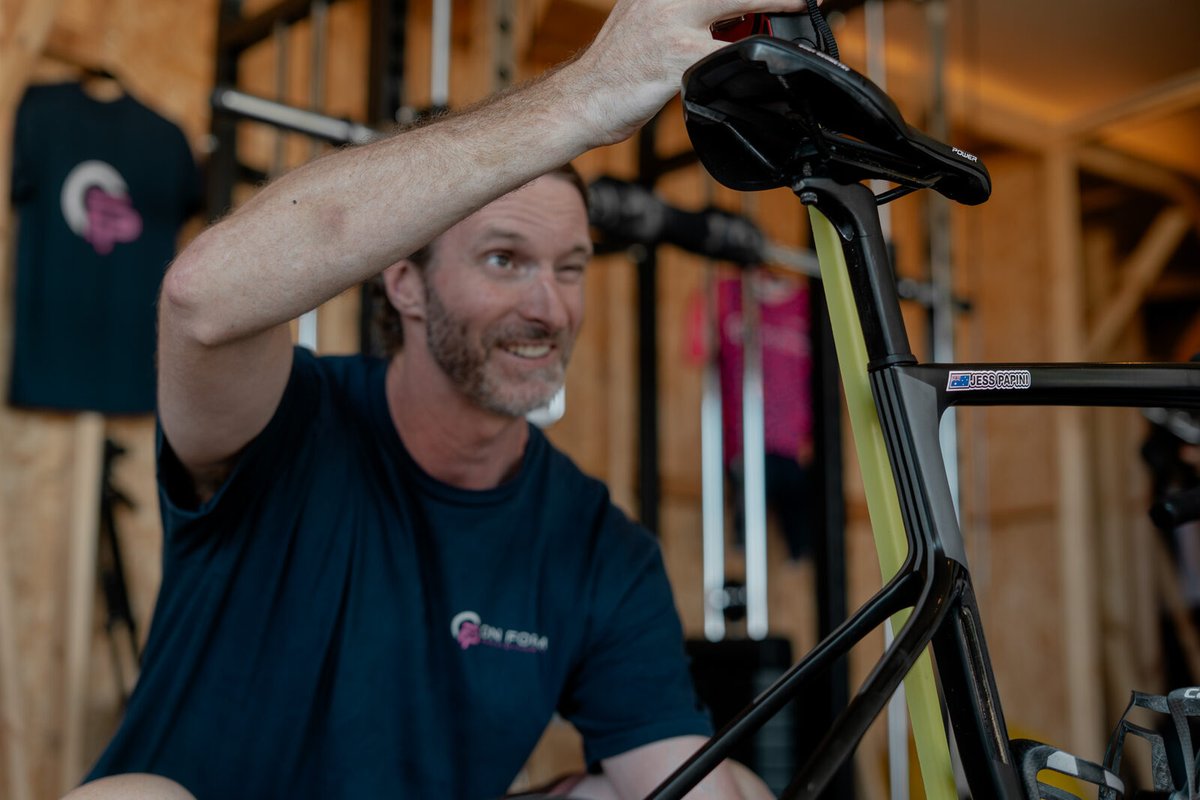 Precision measurement during a bike fit position adjustment at On Form Physio